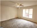 unfurnished room featuring ceiling fan