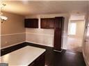 kitchen with dark brown cabinets