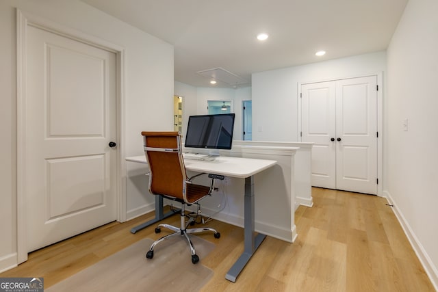 home office featuring light hardwood / wood-style flooring