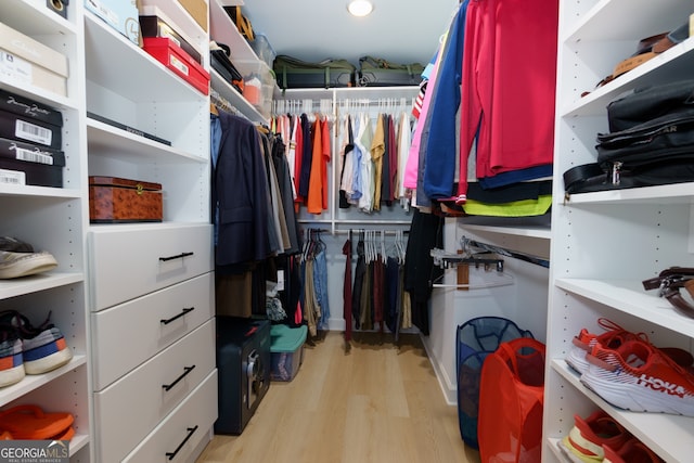 walk in closet featuring light wood-type flooring