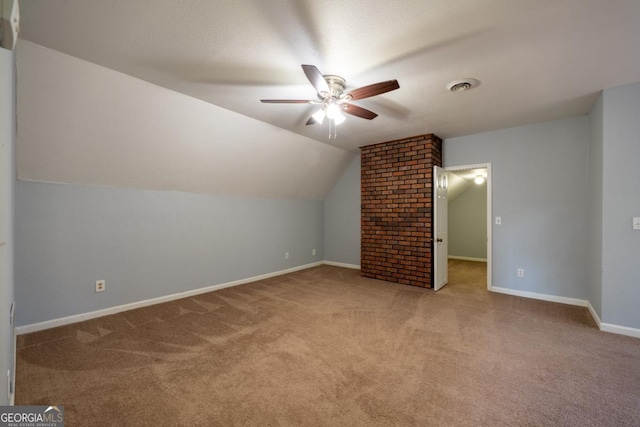 bonus room featuring ceiling fan, light colored carpet, and lofted ceiling