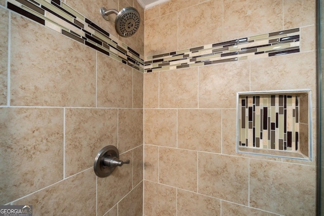 room details with a tile shower