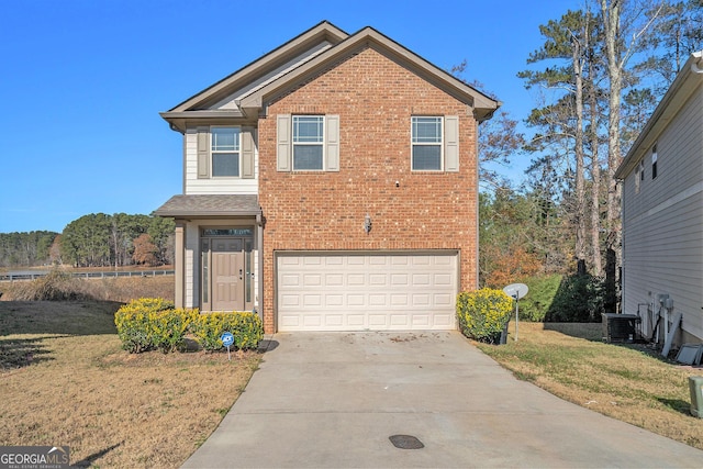 view of property featuring central AC, a garage, and a front lawn