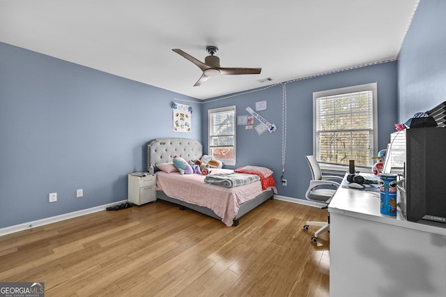 bedroom featuring ceiling fan and light wood-type flooring