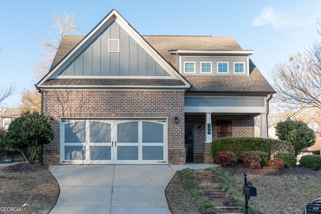 view of front of property with a garage