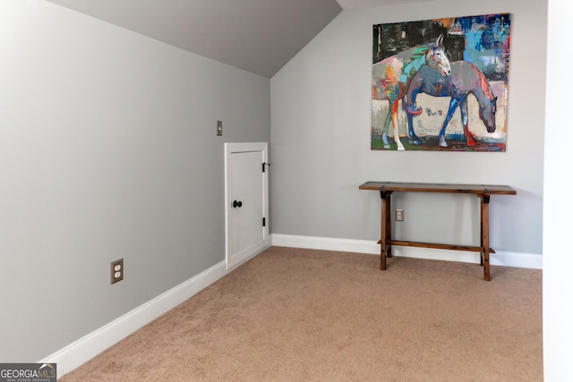 interior space featuring light colored carpet