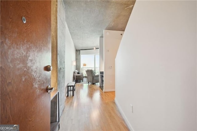 hallway featuring light wood-type flooring