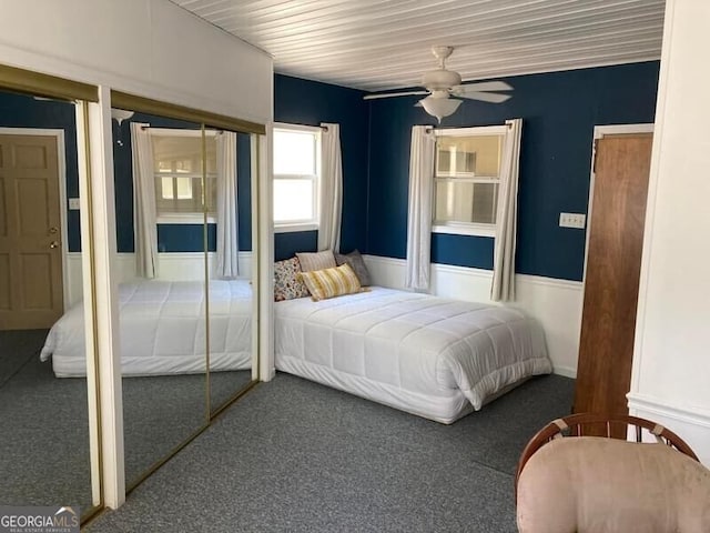 bedroom with ceiling fan and carpet