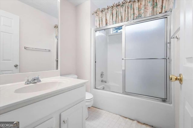 full bathroom with toilet, enclosed tub / shower combo, and vanity