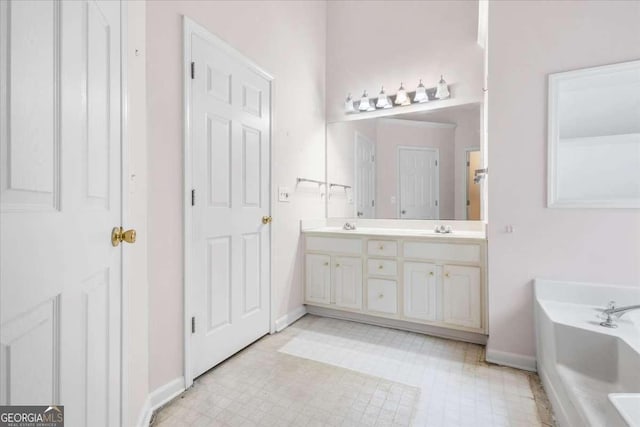 bathroom with a bathtub and vanity