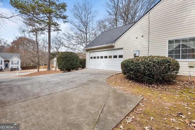 view of home's exterior with a garage