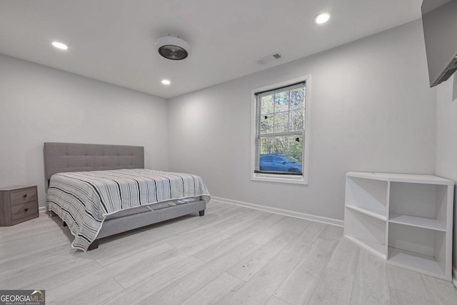 bedroom featuring light hardwood / wood-style floors