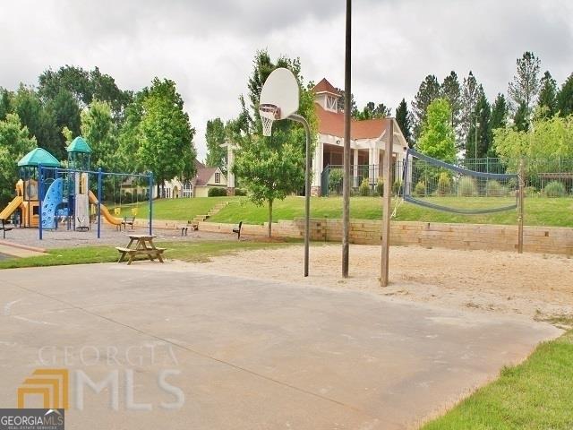 communal playground featuring volleyball court