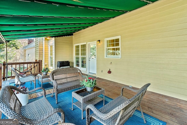 view of patio featuring outdoor lounge area and a deck