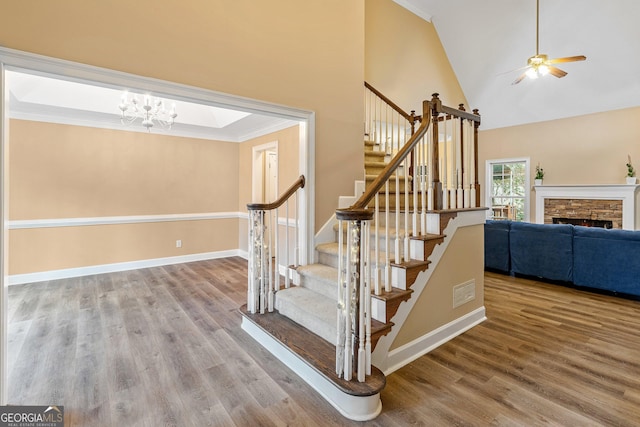 interior space featuring stairway, wood finished floors, visible vents, and baseboards