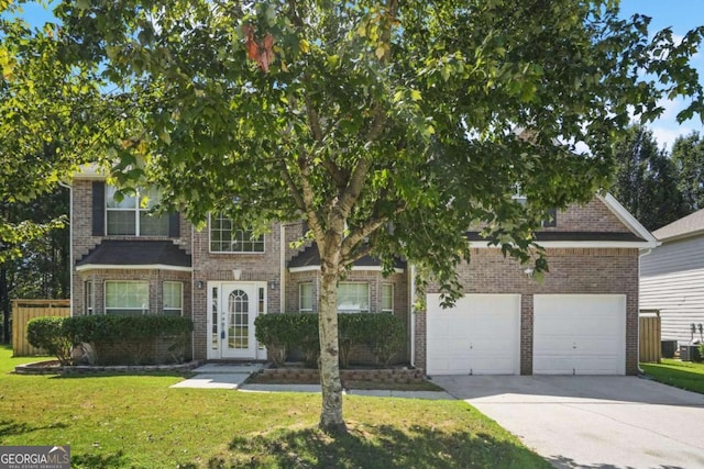 view of property hidden behind natural elements featuring a front yard