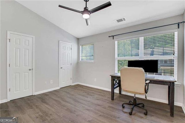 office area with ceiling fan, dark hardwood / wood-style flooring, and vaulted ceiling