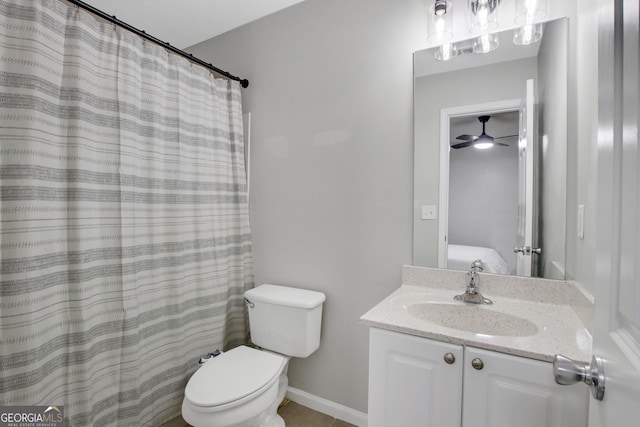 ensuite bathroom with ensuite bath, toilet, and vanity