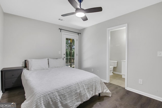 bedroom with access to exterior, ensuite bathroom, visible vents, baseboards, and wood finished floors