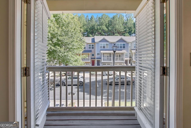 balcony featuring a residential view
