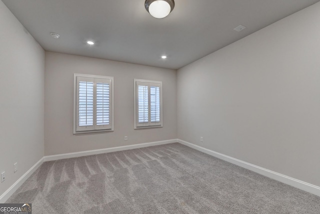 view of carpeted spare room