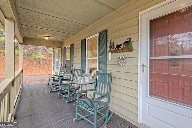 deck featuring covered porch