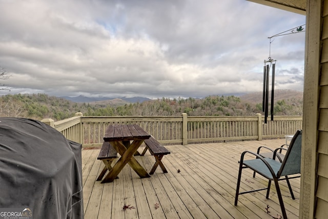 deck featuring grilling area and a mountain view