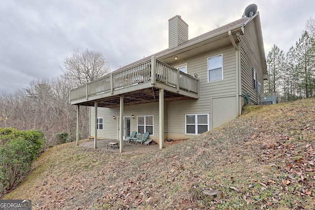 rear view of house with a deck