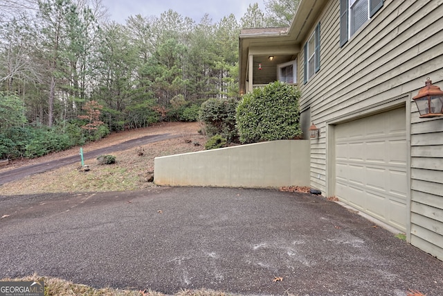 exterior space with a garage