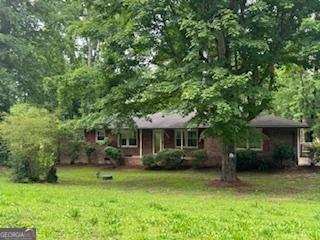 4485 Canary Ct, Lithia Springs, GA 30122 - view of front of home featuring a front lawn
