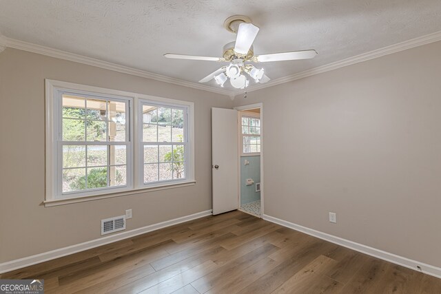 4485 Canary Ct, Lithia Springs, GA 30122 - kitchen with white appliances, a ceiling fan, brown cabinetry, a sink, and wood finished floors