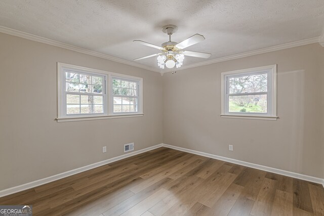 4485 Canary Ct, Lithia Springs, GA 30122 - bathroom featuring tile walls, ornamental molding, toilet, and vanity