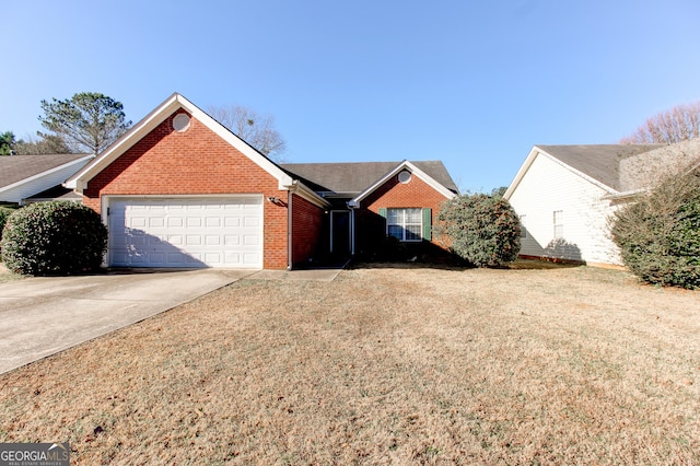 1624 Graystone Dr, Hampton, GA 30228 - view of front of property featuring an attached garage, brick siding, concrete driveway, and a front lawn