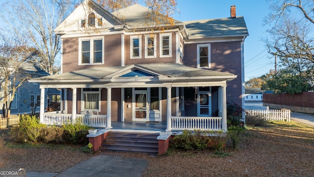 view of front of property featuring covered porch