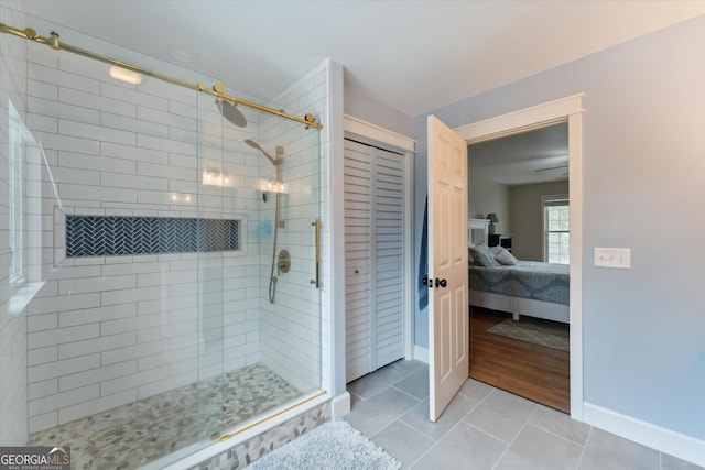 bathroom with wood-type flooring and walk in shower