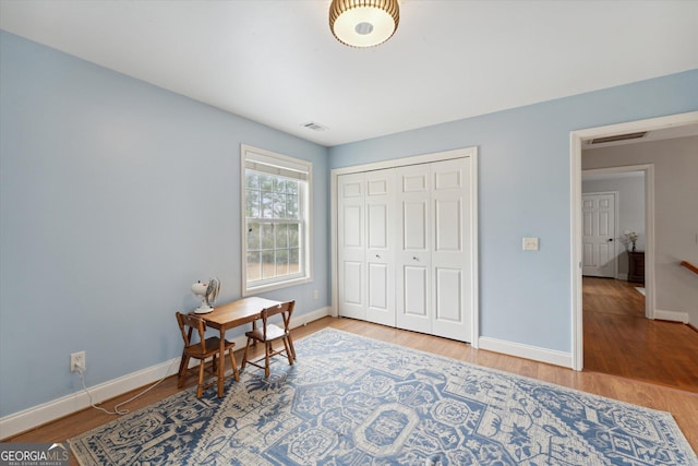 office area with hardwood / wood-style floors