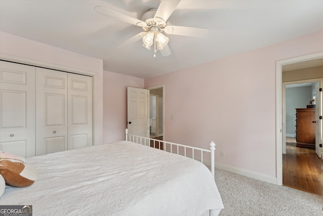 bedroom with light carpet, a closet, and ceiling fan