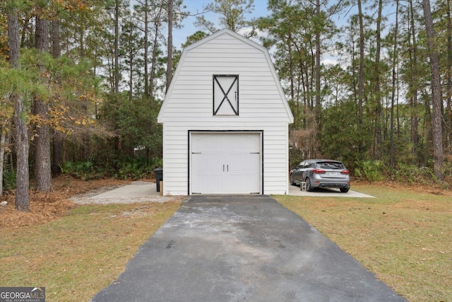 garage with a yard