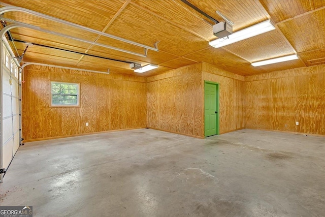 garage with wood walls