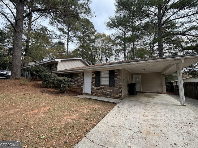 view of front of property with a carport