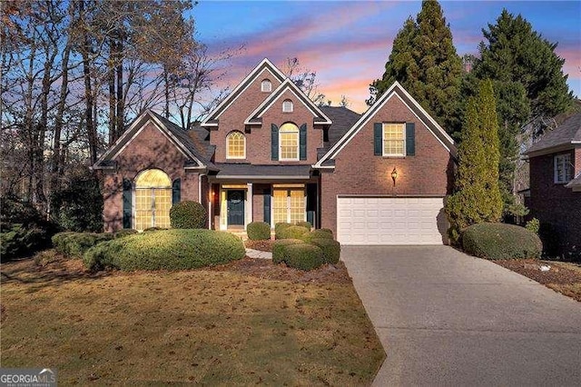 front of property with a garage