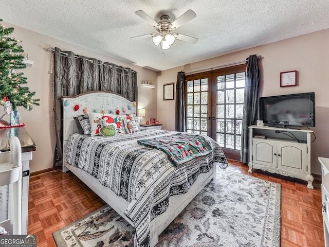 bedroom featuring ceiling fan, french doors, parquet floors, and a textured ceiling