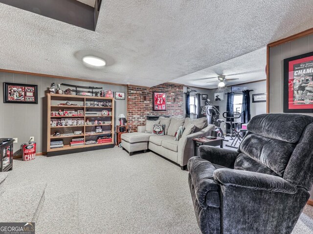 living room with carpet, ceiling fan, ornamental molding, and a textured ceiling