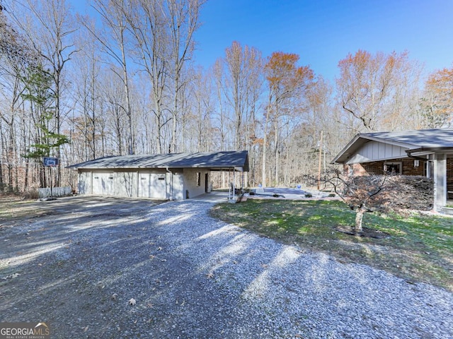 view of home's exterior with a carport