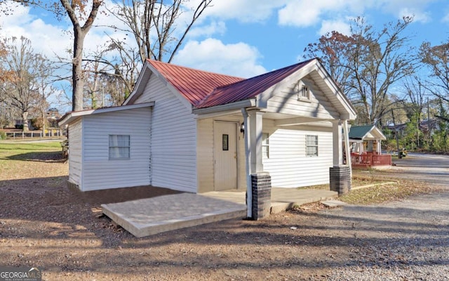 view of home's exterior featuring a porch