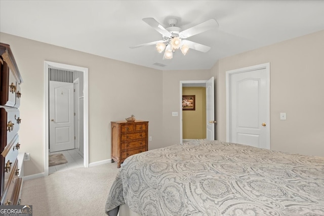 bedroom with light colored carpet and ceiling fan