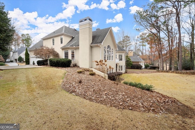 view of property exterior with a lawn