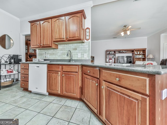 kitchen featuring decorative backsplash, ceiling fan, crown molding, sink, and dishwasher