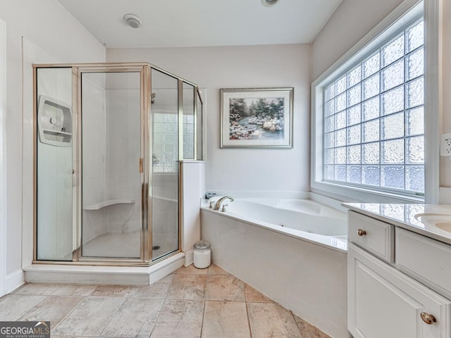 bathroom featuring vanity, tile patterned floors, and independent shower and bath