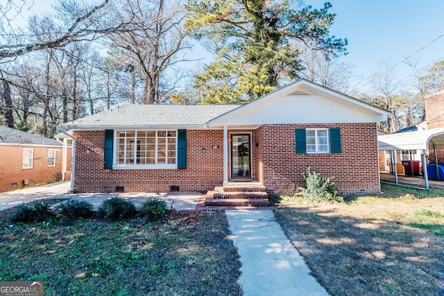 view of front of house with a carport